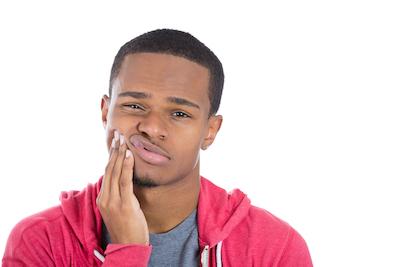 emergency tooth extraction | man with toothache
