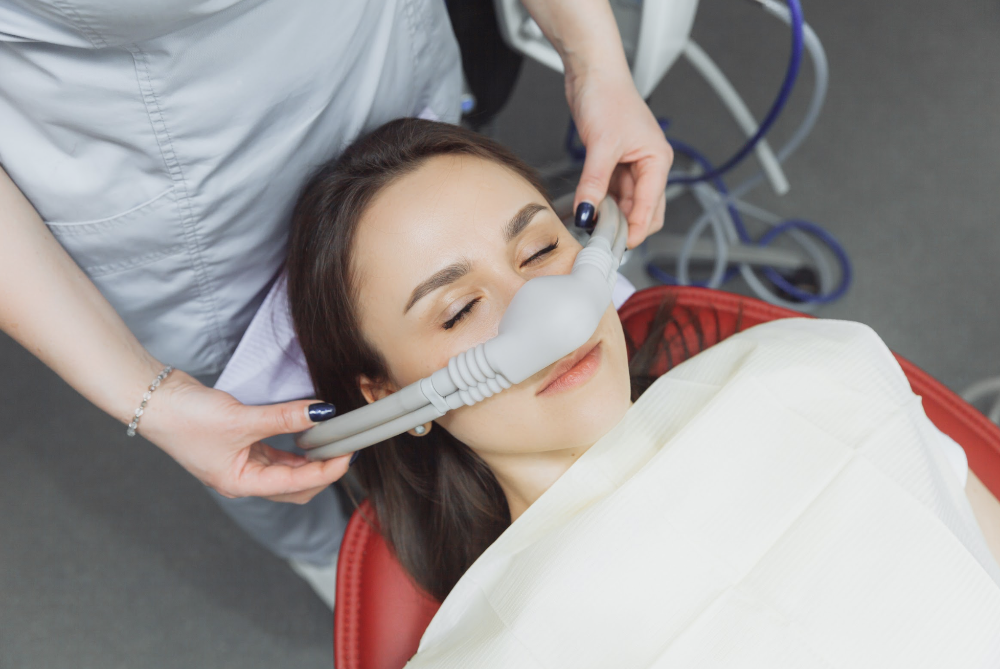 sedation dentistry near me | woman at dentist