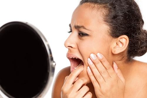 emergency dentist west allis | woman with tooth pain