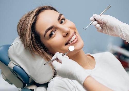 dental cleaning near me | woman at west allis dentist