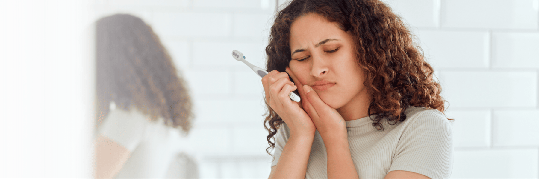 woman with toothache in milwaukee