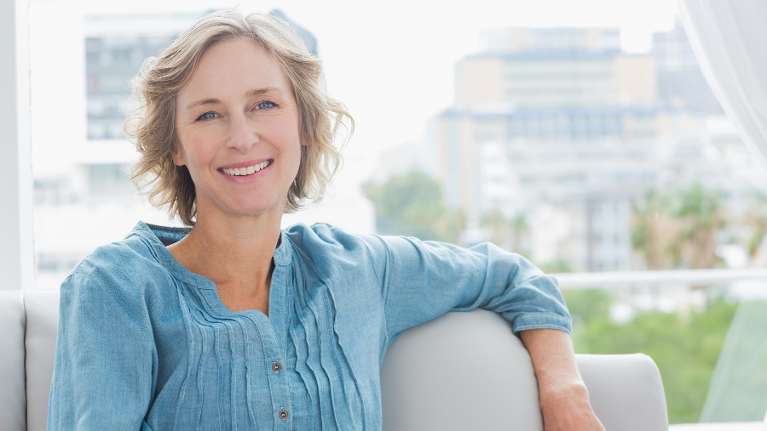 tooth extraction west allis | woman smiling
