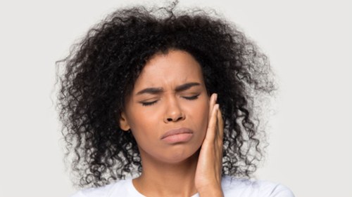 woman needing immediate toothache appointment in west allis