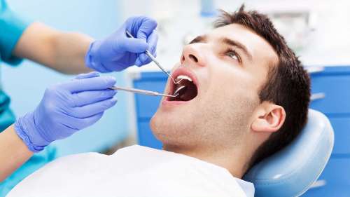 patient receiving preventive care after emergency dental care in Milwaukee