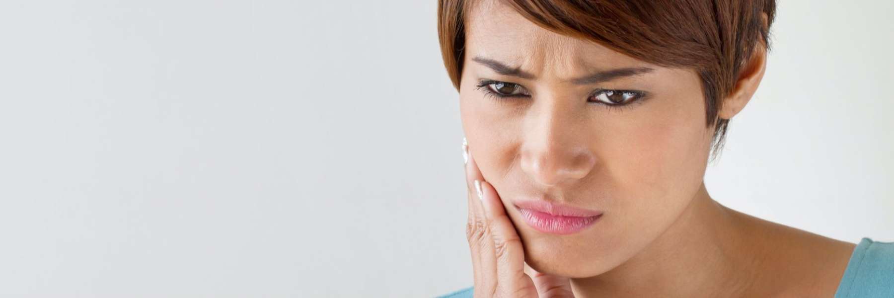woman with dental pain in west allis, WI